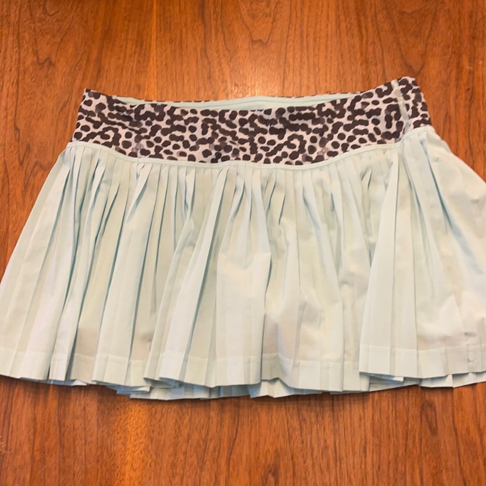 Adorable turquoise pleated tennis skirt